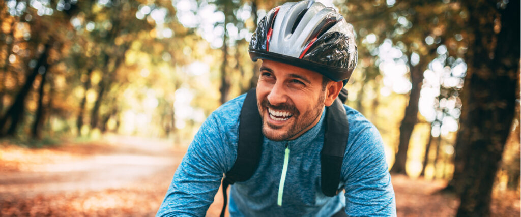 home-page-banner-man-helmet-bike-full-strength-physcial-therapy-alexandria-springfield-arlington-va